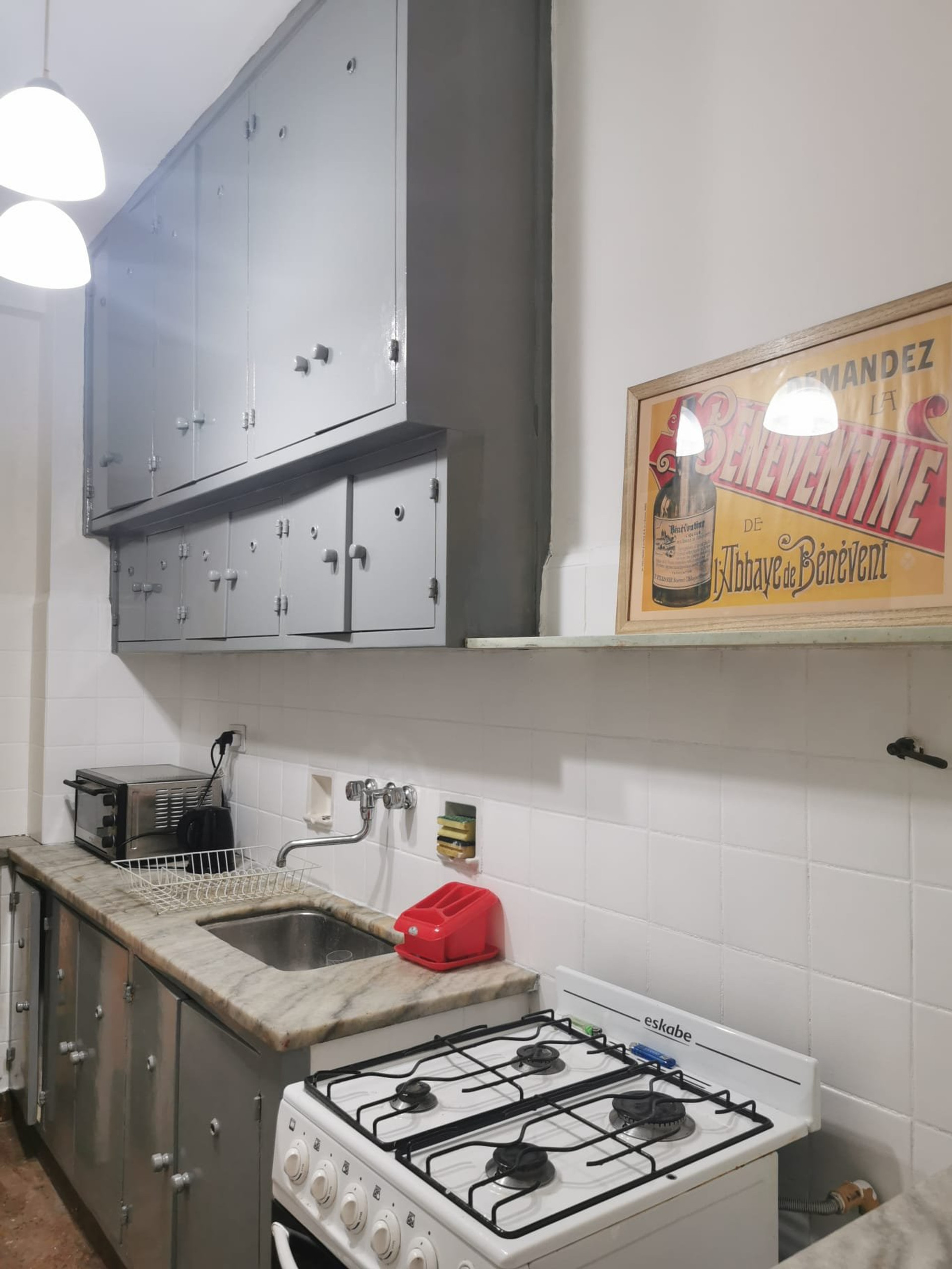 Kitchen with gas stove and cabinets