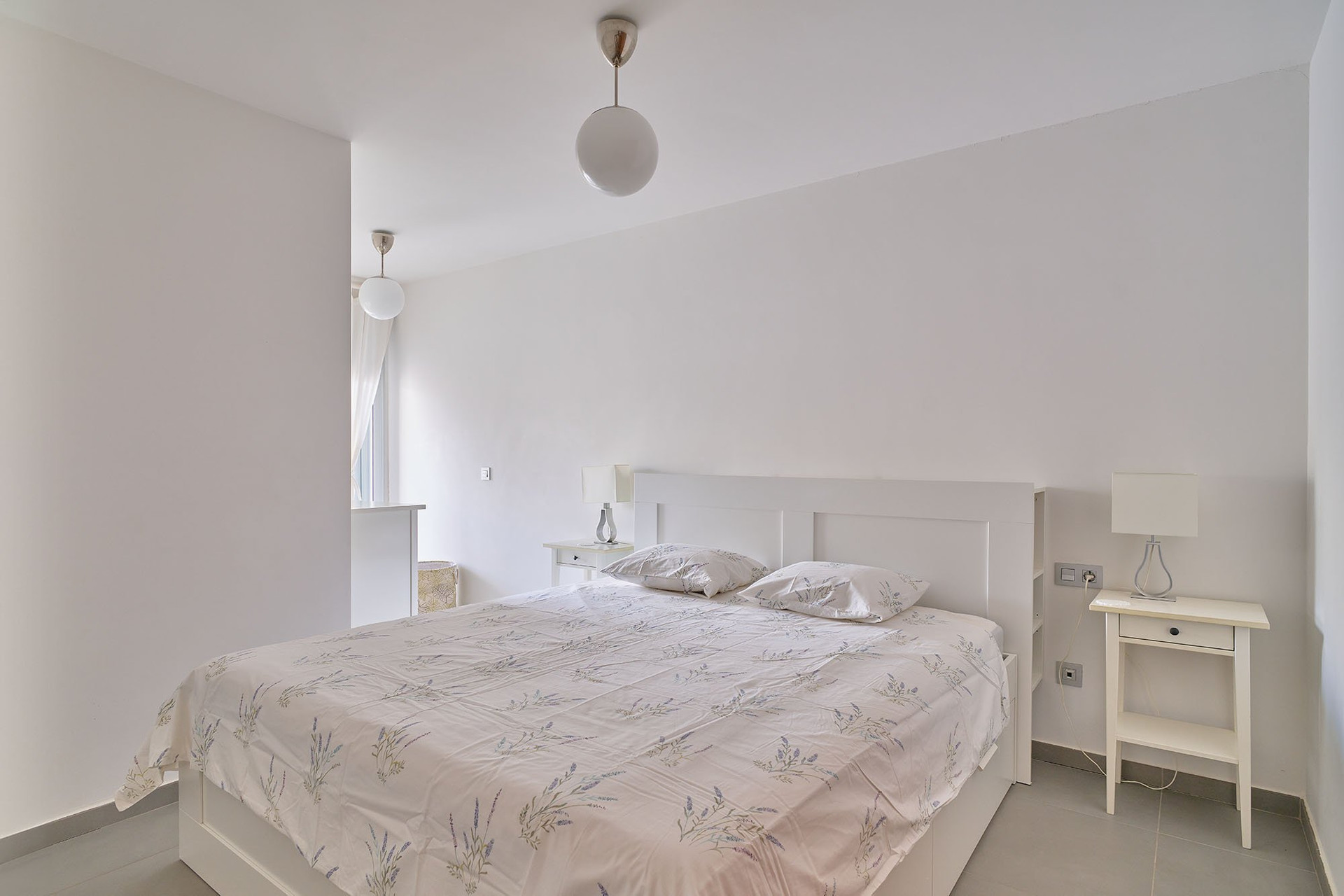 White double bedroom with nightstands