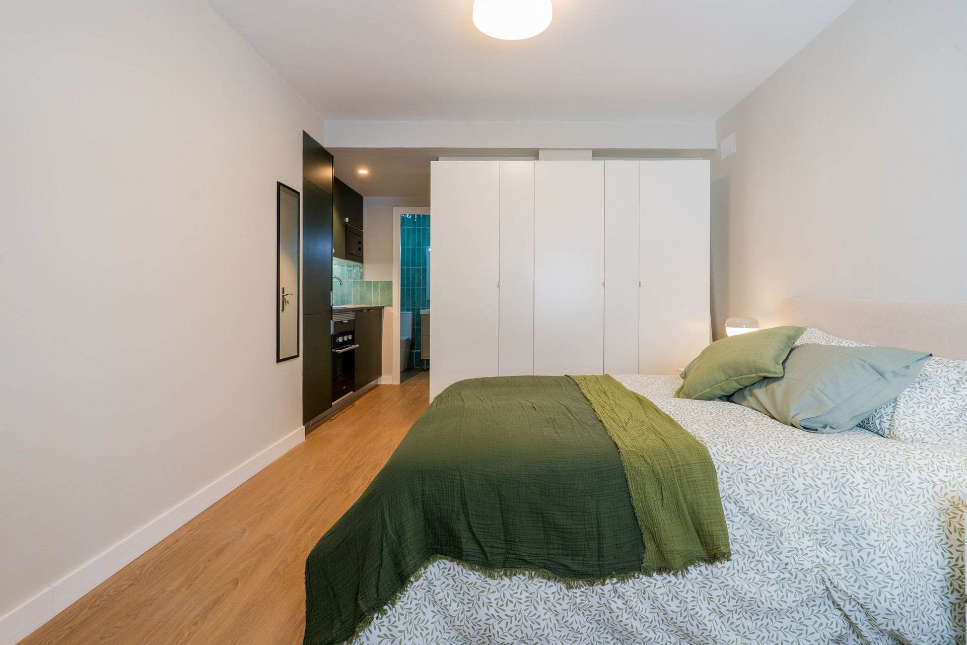 Bedroom with wardrobe and open door