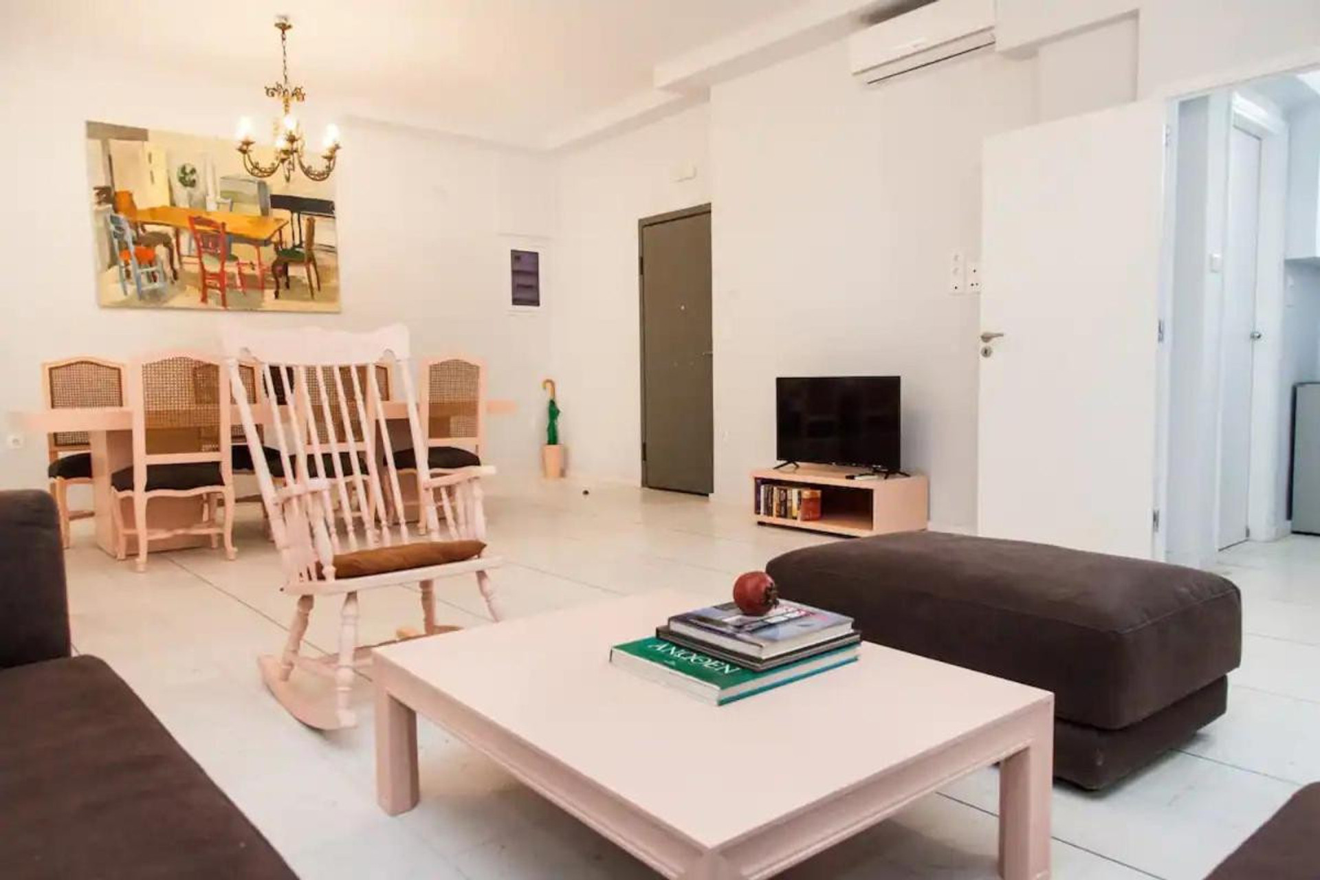 Spacious. highceilinged light living area with smart tv