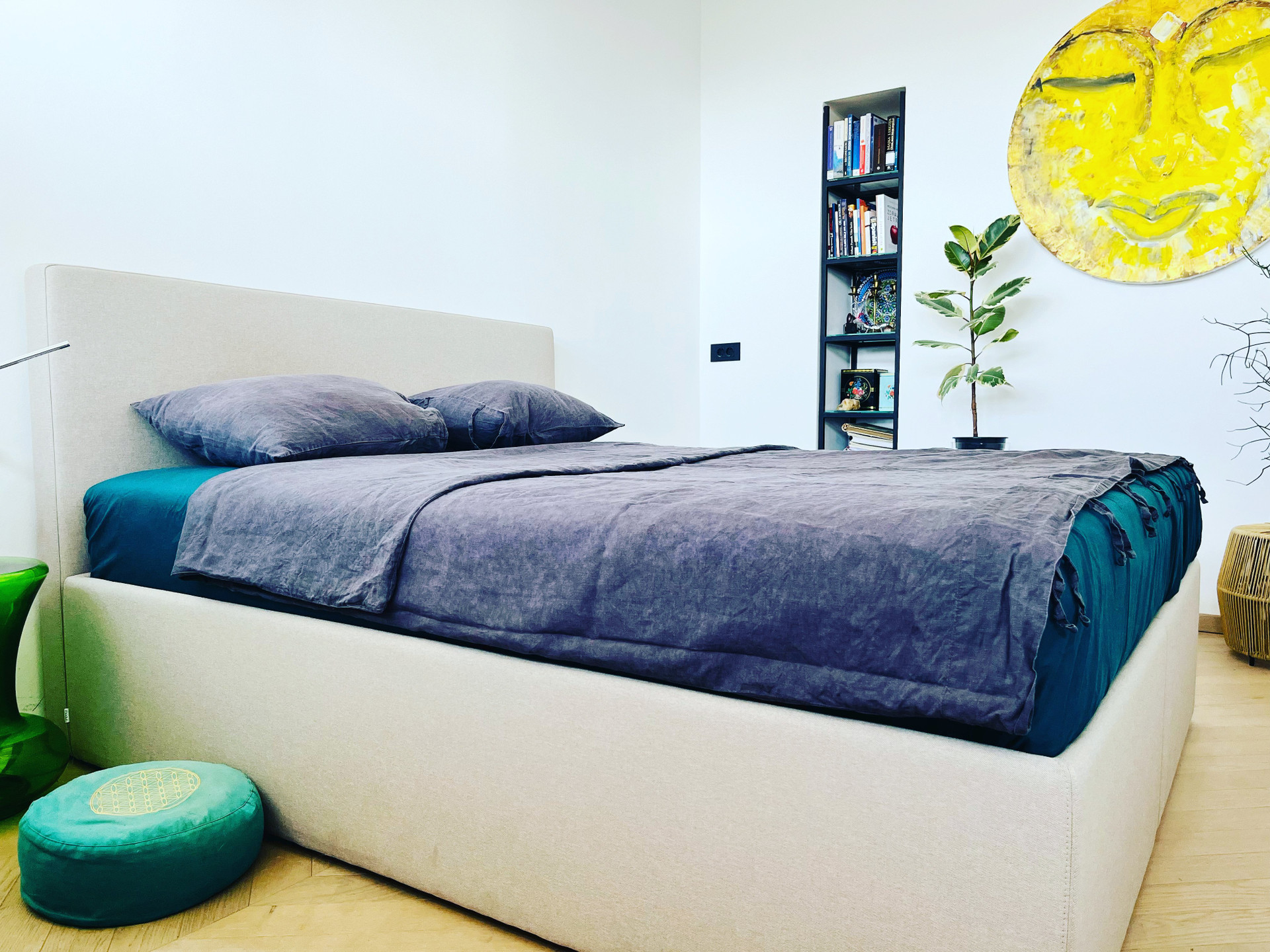 Bedroom with double bed artwork