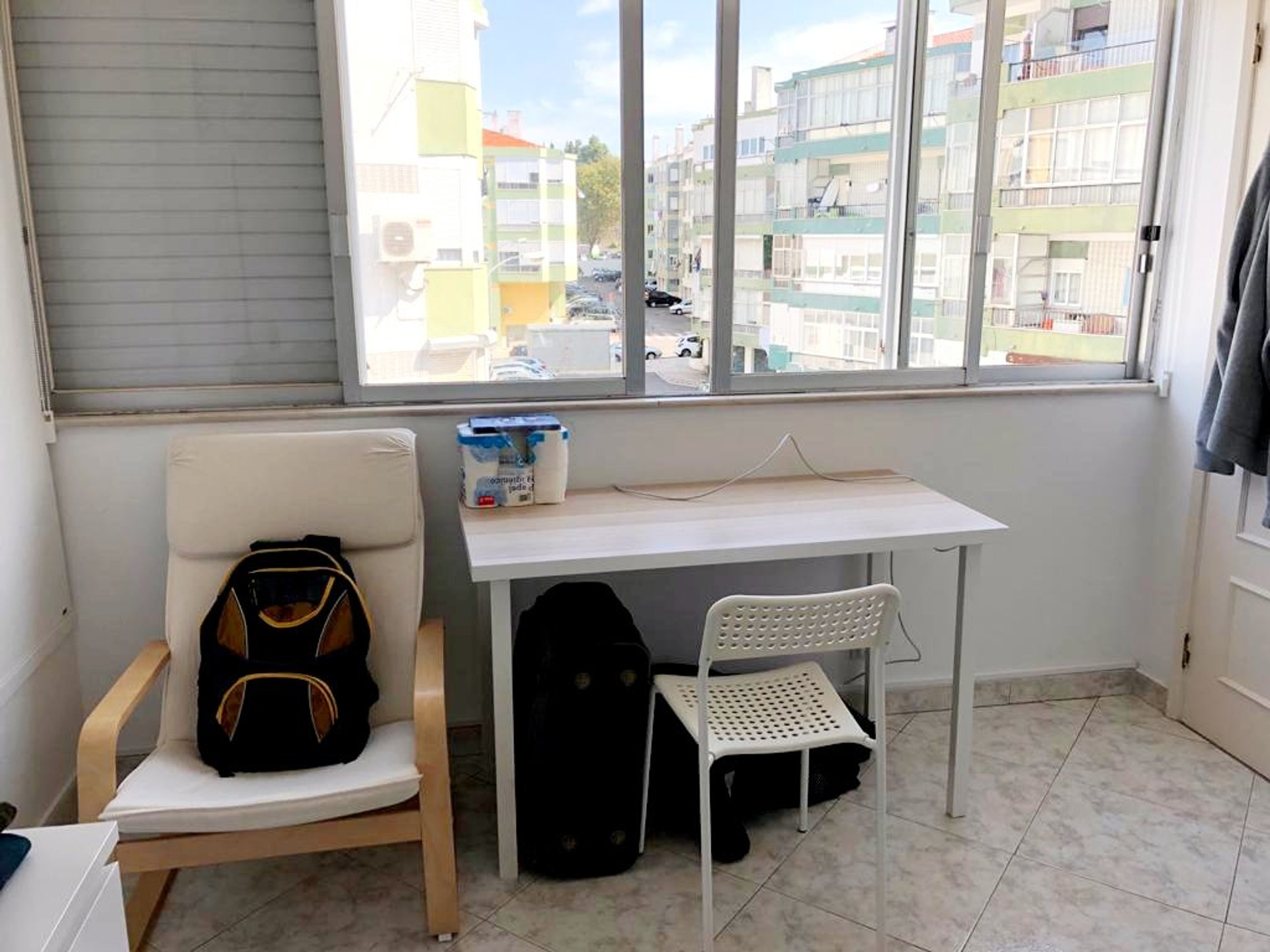 Desk and chair by window