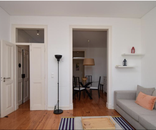 Living room with sofa doors