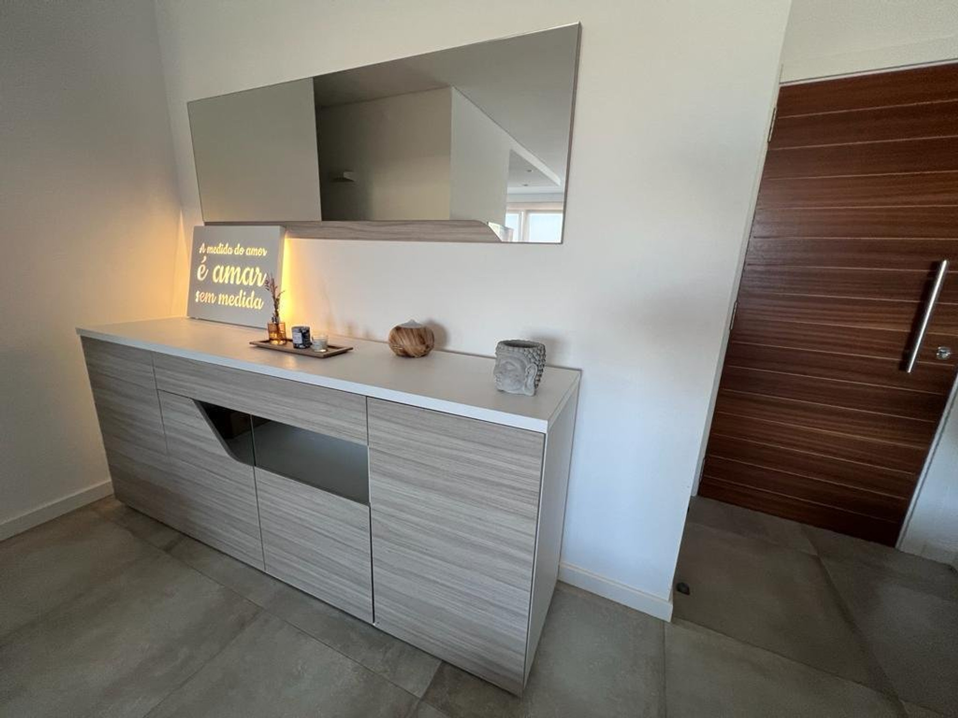 Sideboard with mirror and entrance door