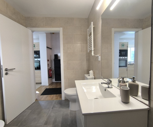 Bathroom with sink and toilet