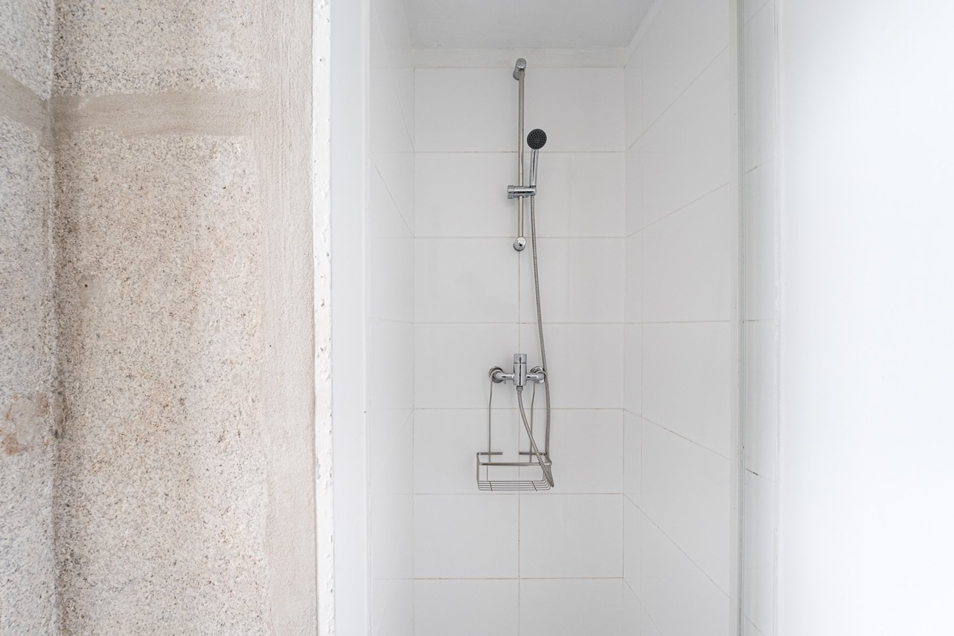 White tiled shower stall