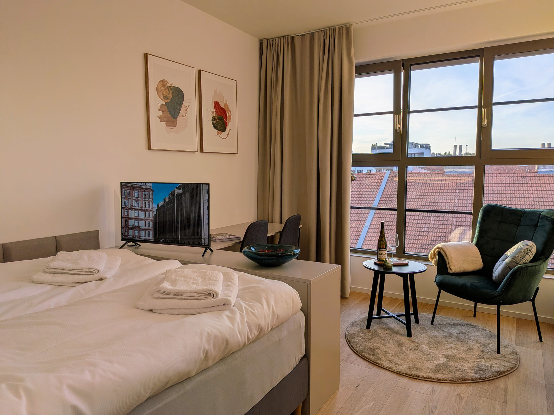 Bedroom with city rooftop view
