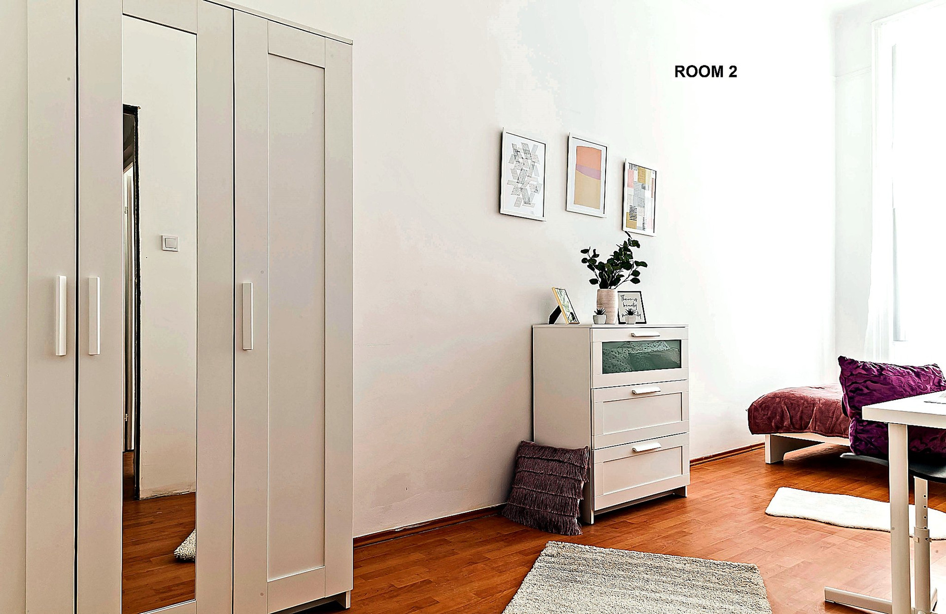 Large wardrobe and additional storage furniture provide ample space for clothes, luggage and personal belongings during medium-term stays.