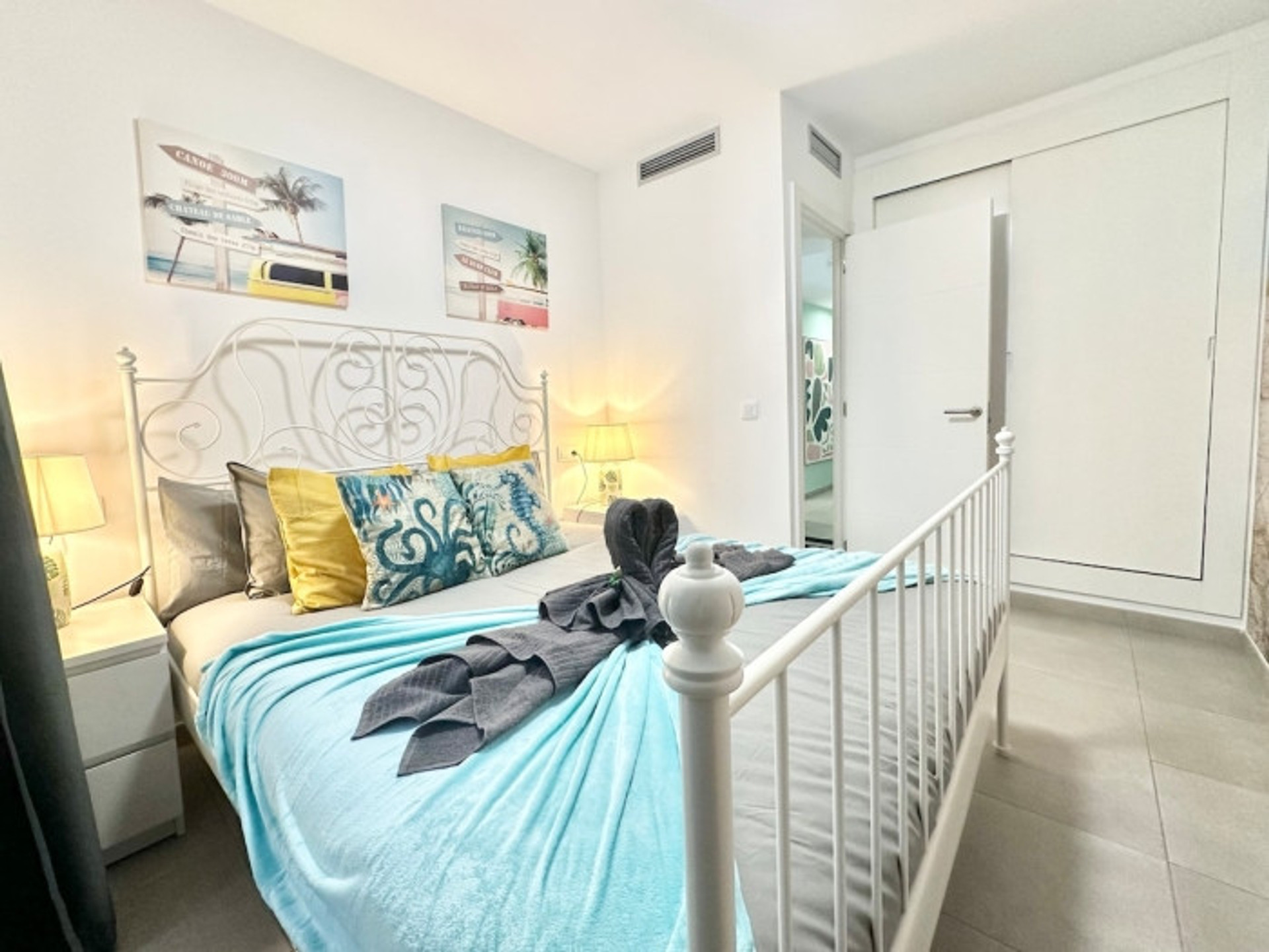 Bedroom double bed colorful pillows