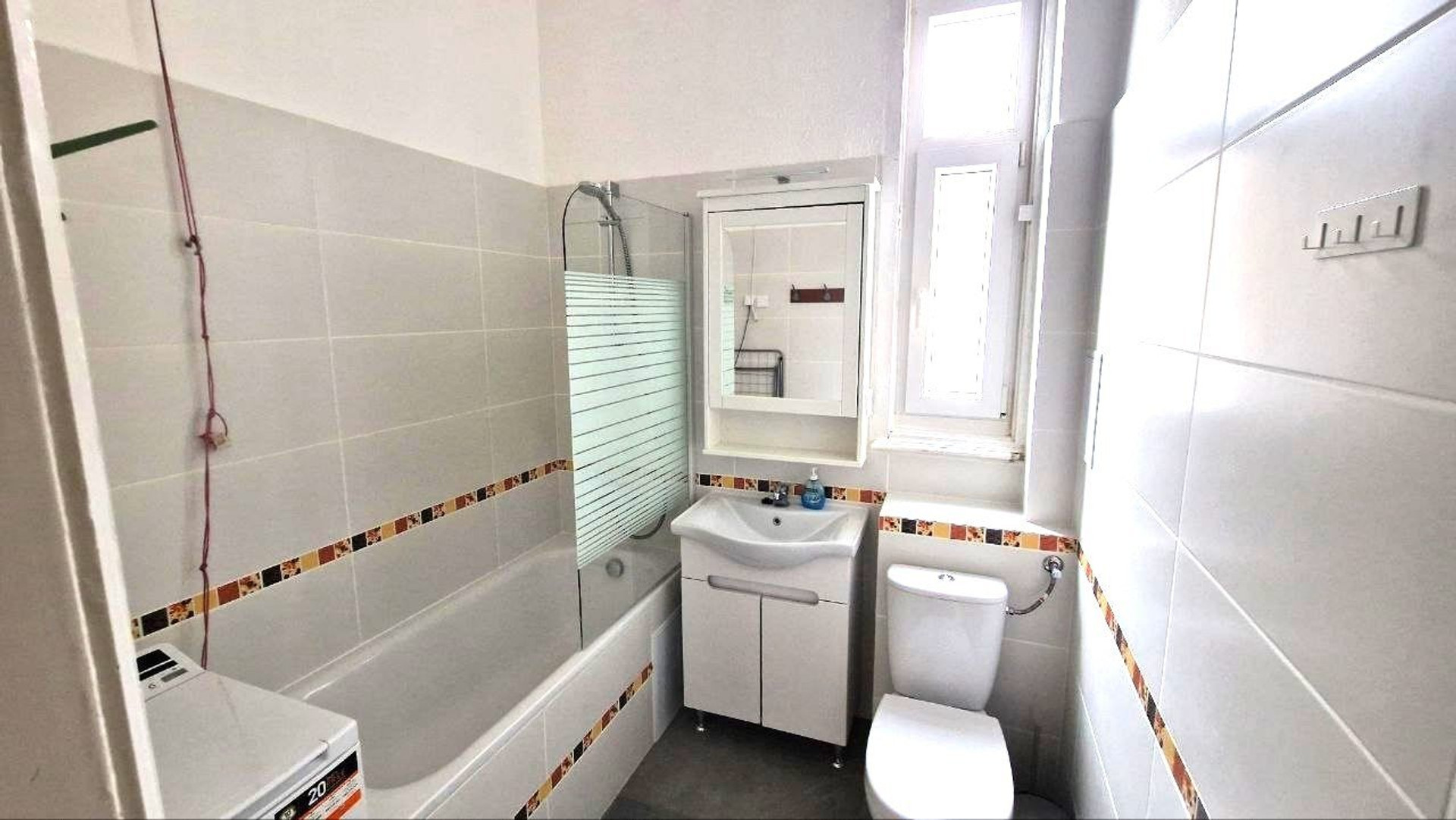 Bathroom with sink and toilet