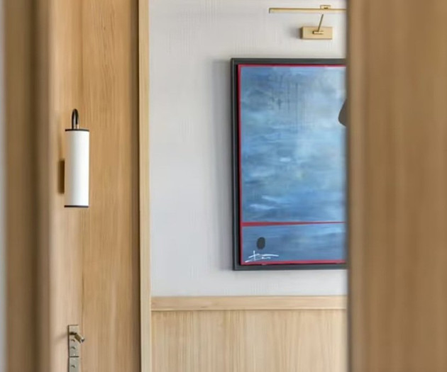 Wood door and framed artwork