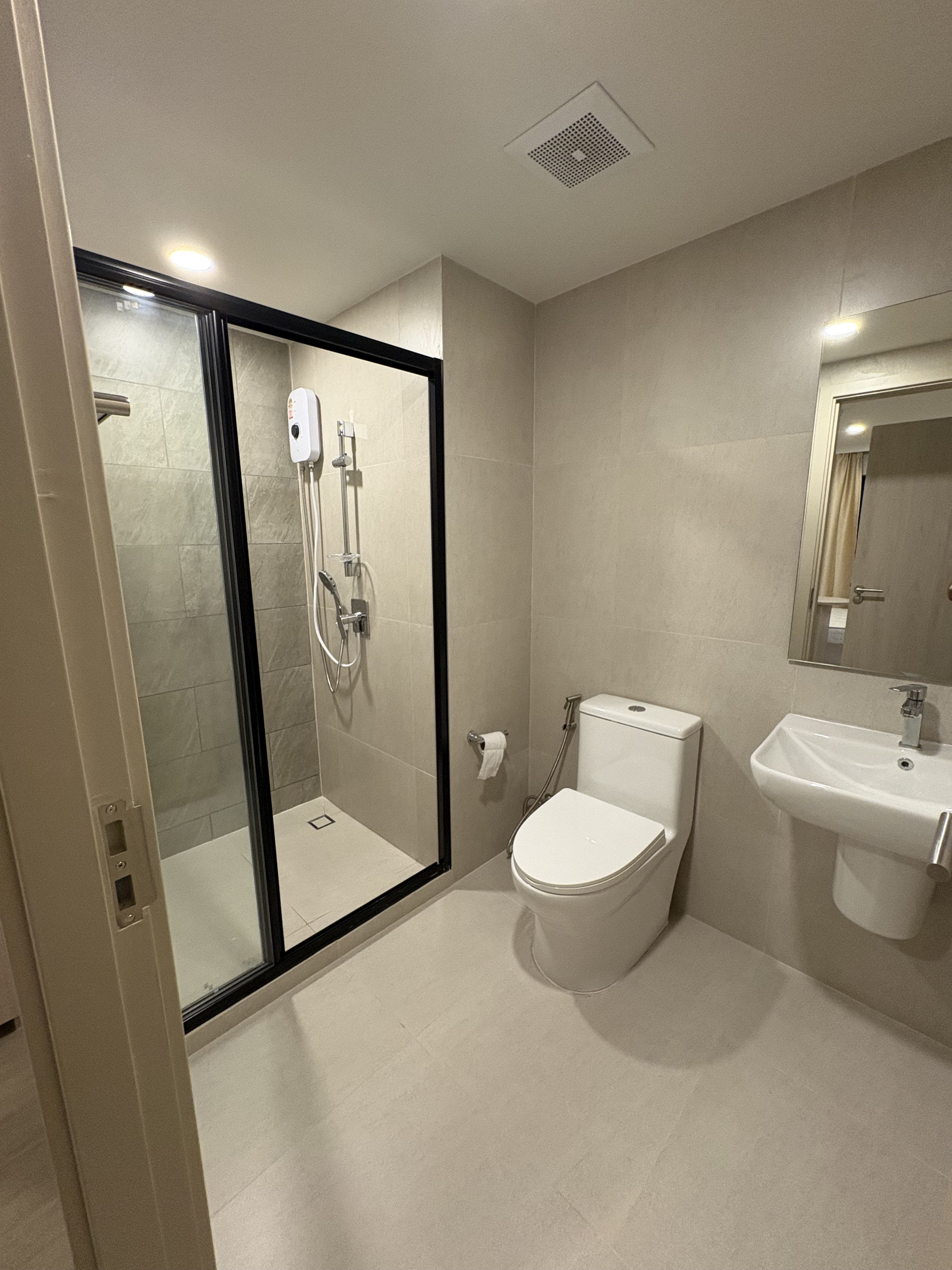 2nd ensuite bathroom with shower and toilet