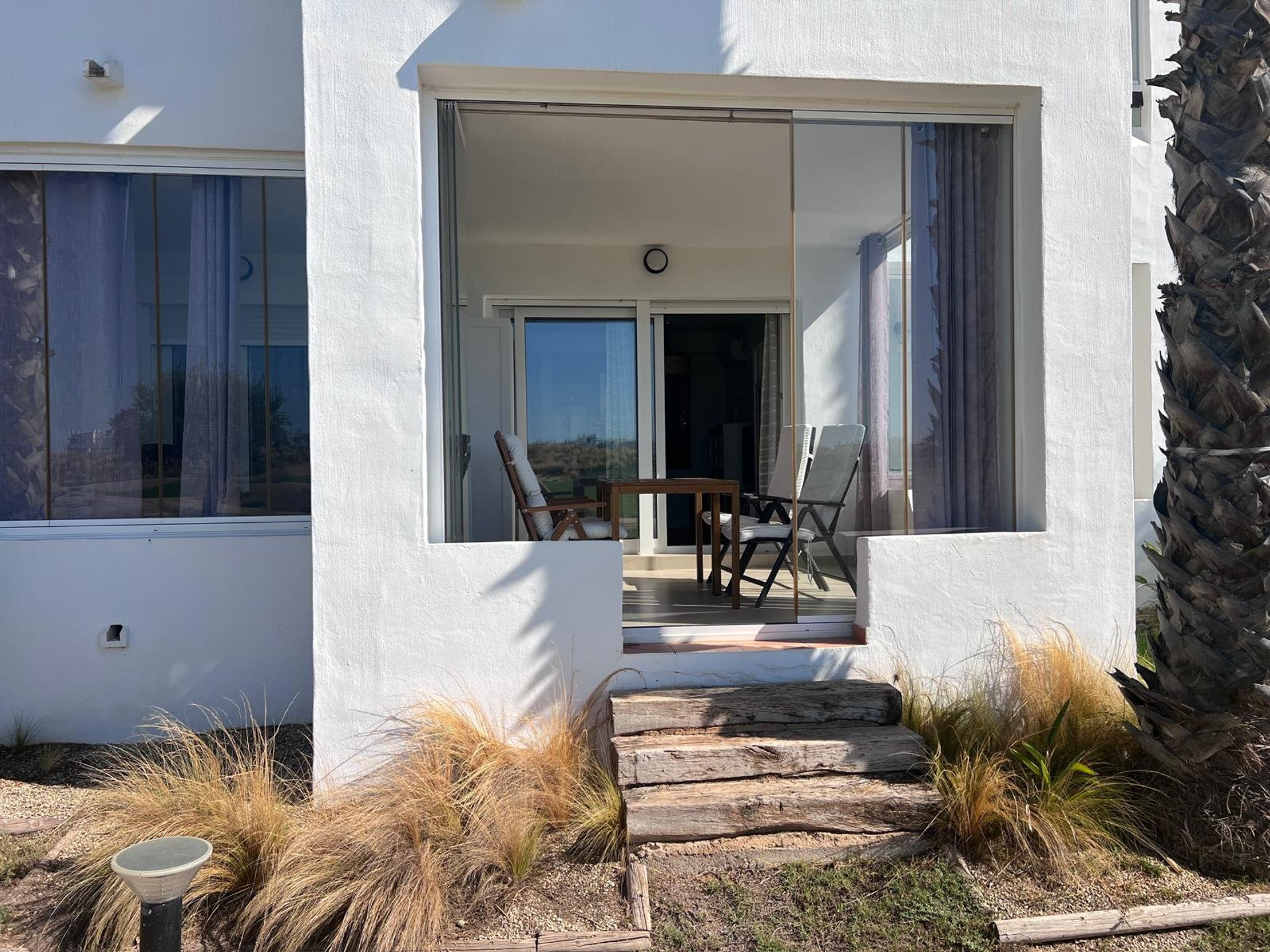 Ground-floor terrace with garden steps