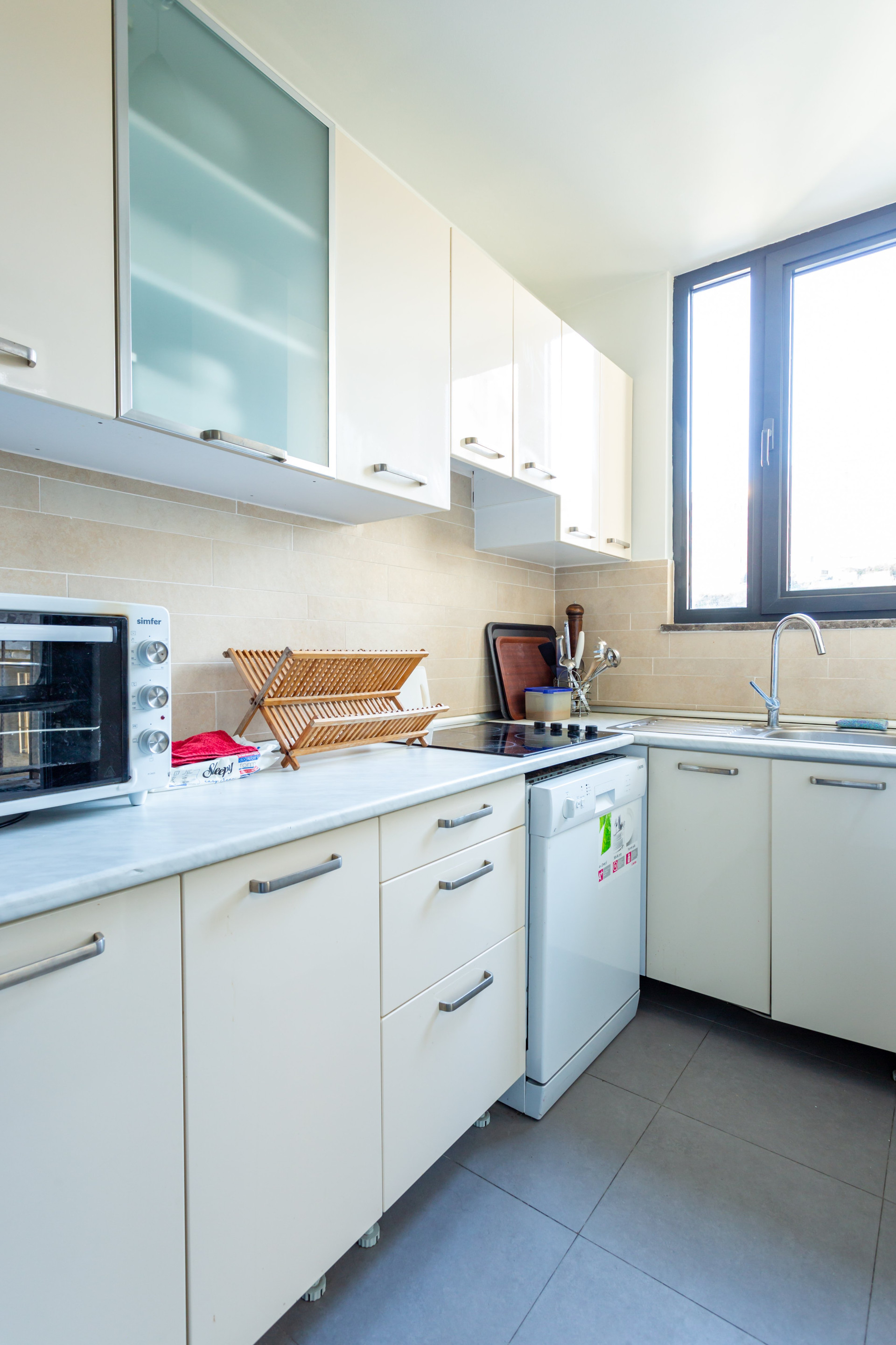 White kitchen cabinets appliances