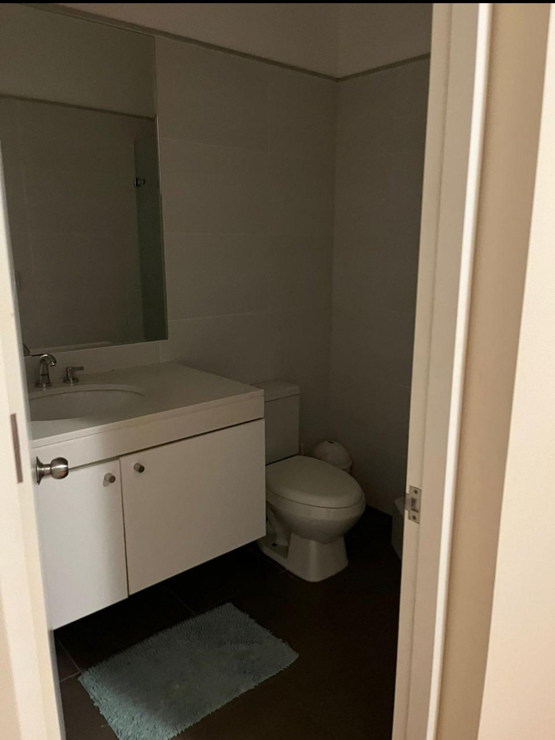 Bathroom with vanity and mirror