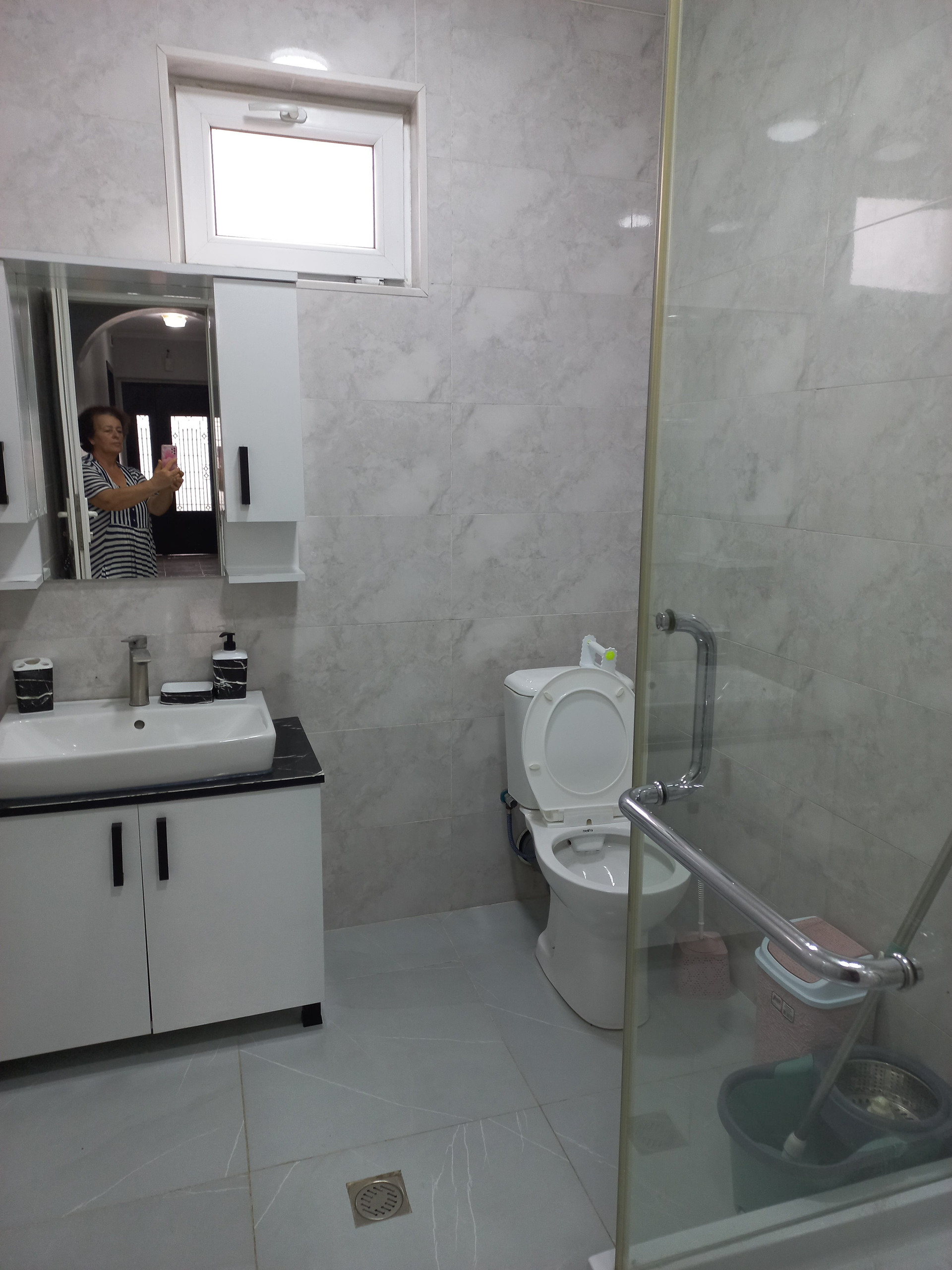 Bathroom with sink and toilet