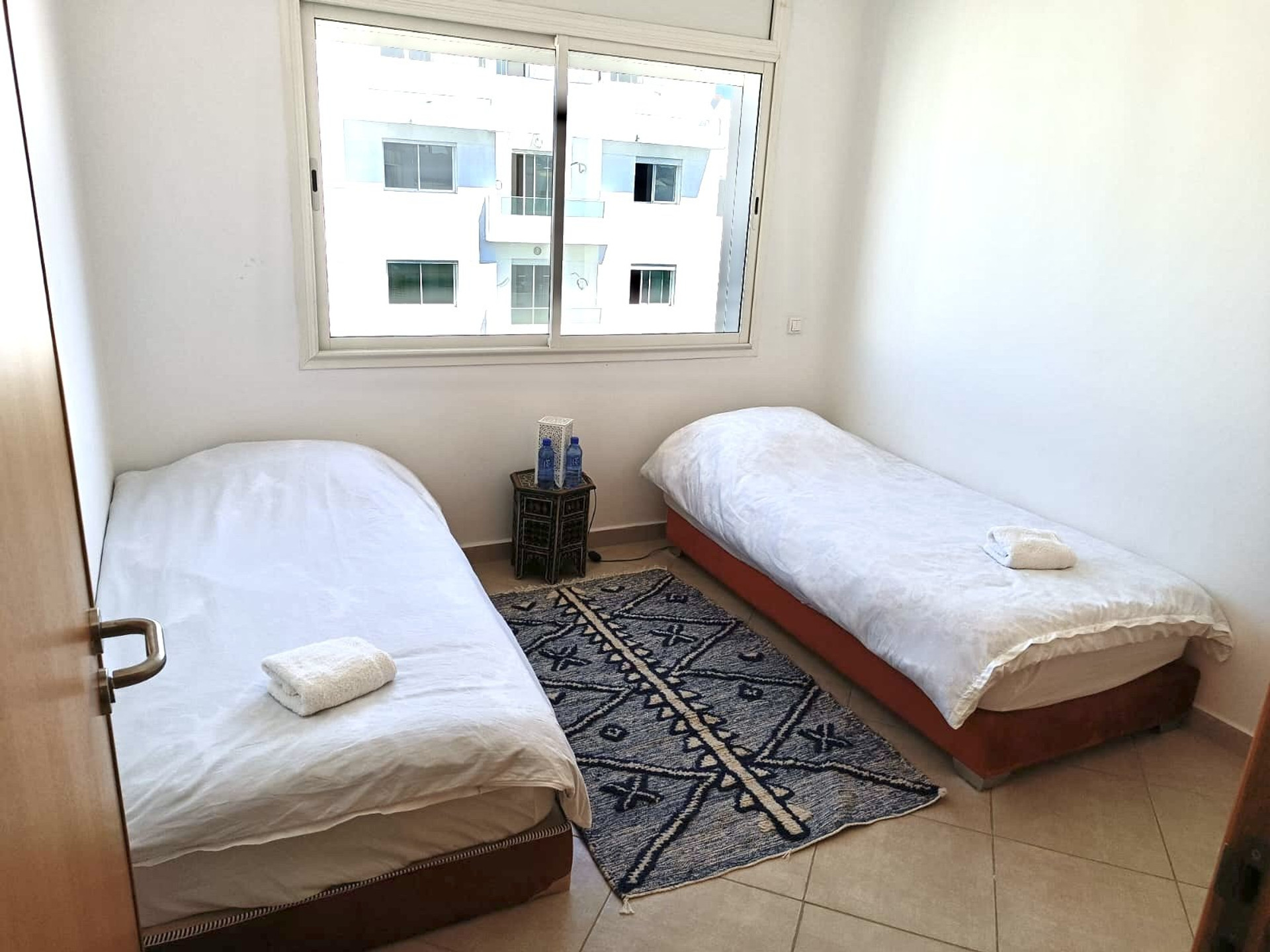 Twin bedroom with two single beds