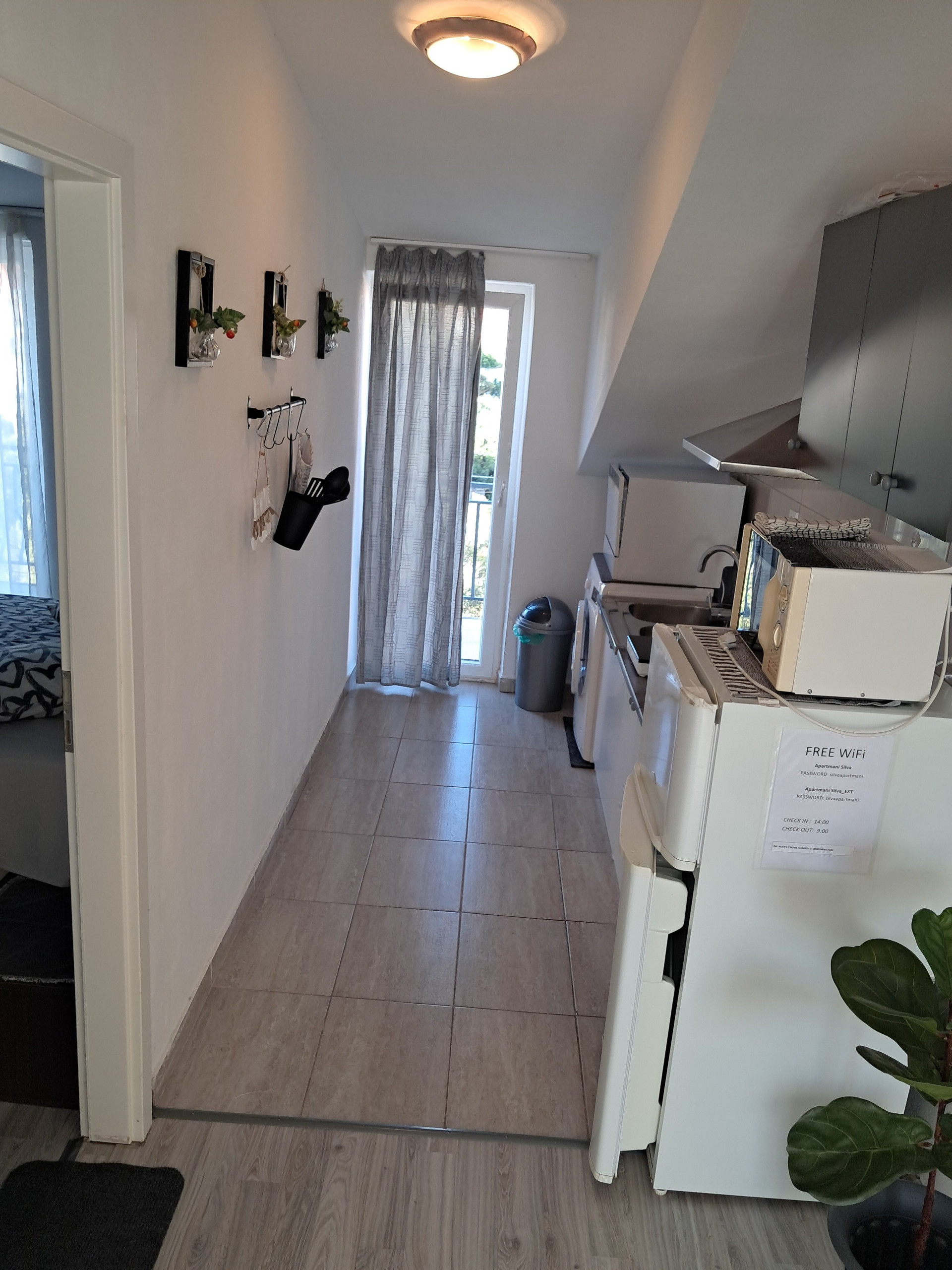 Kitchen hallway with appliances