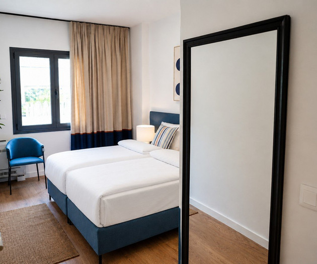 Twin bedroom with mirror