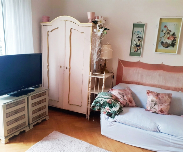 Bedroom with TV and wardrobe