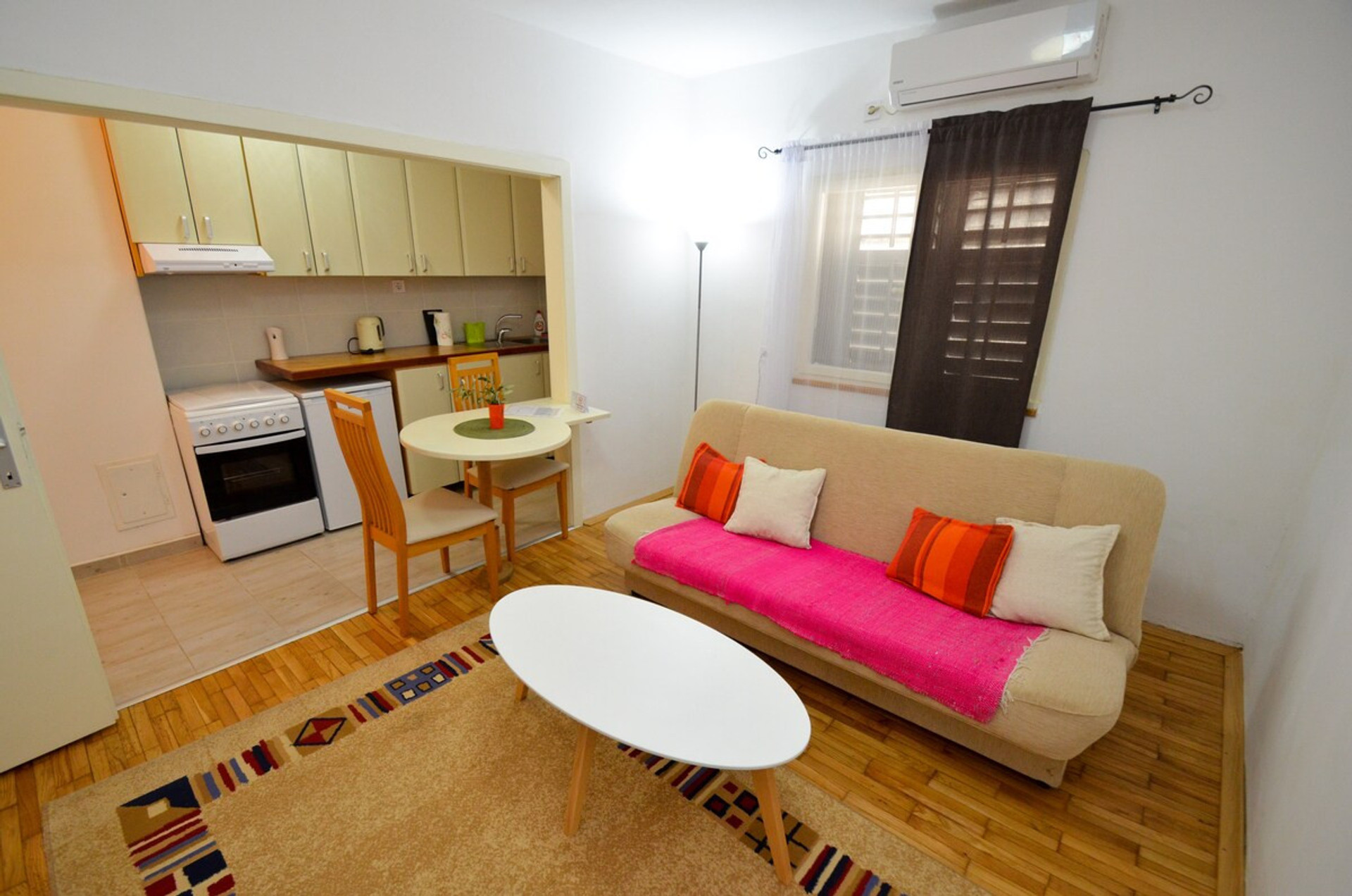 Olive apartment, living room- view to the kitchen