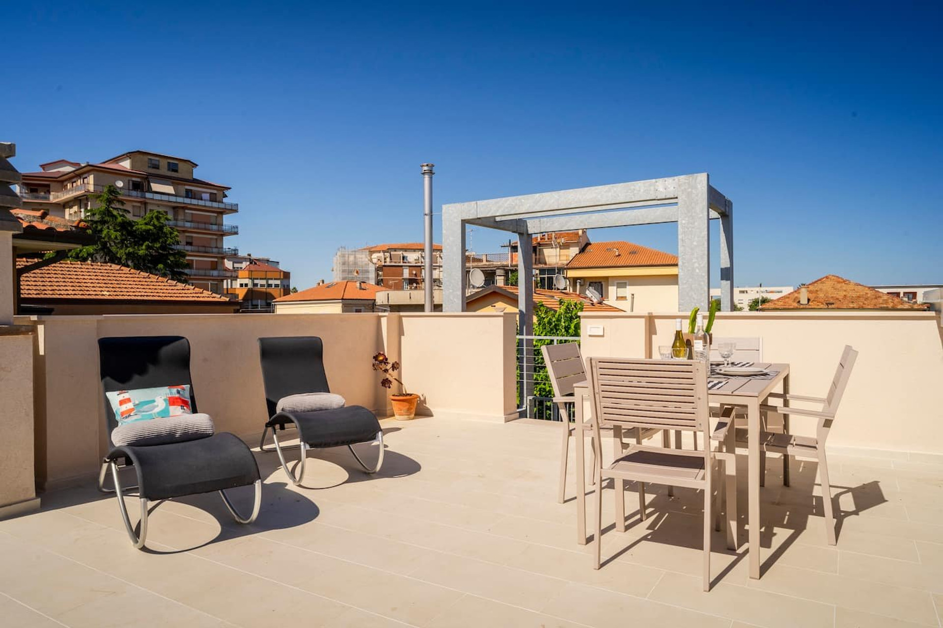 Rooftop terrace with seating and dining