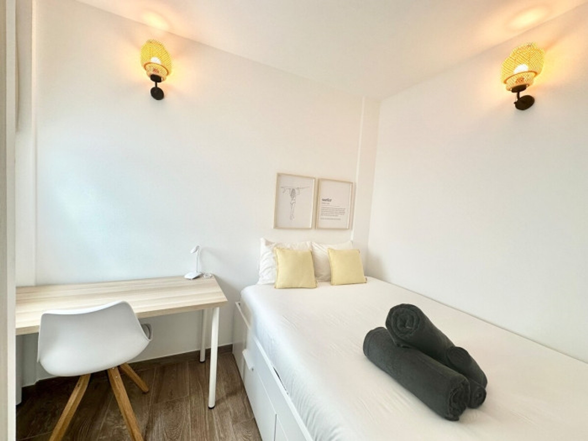 Cozy single bedroom with desk