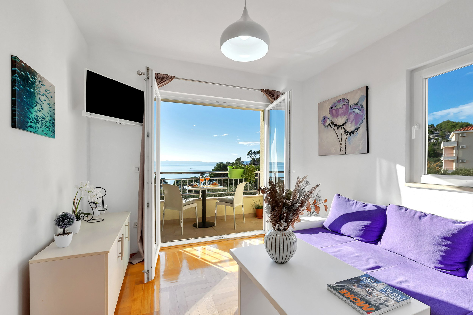 Bright living room, sofa, balcony
