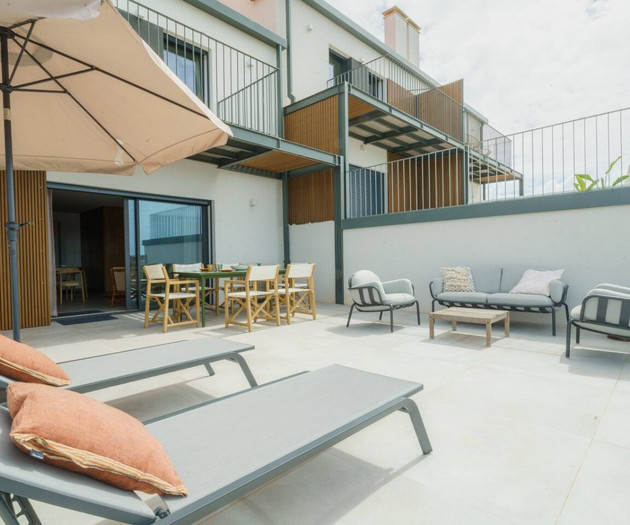 Terrace with dining and loungers