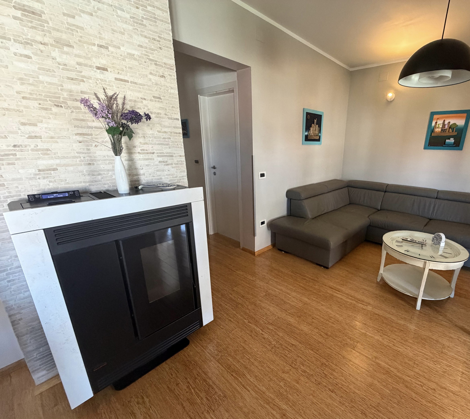 Living room with fireplace and sofa