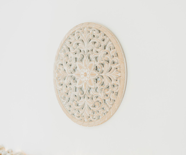 Carved wall decor with stones