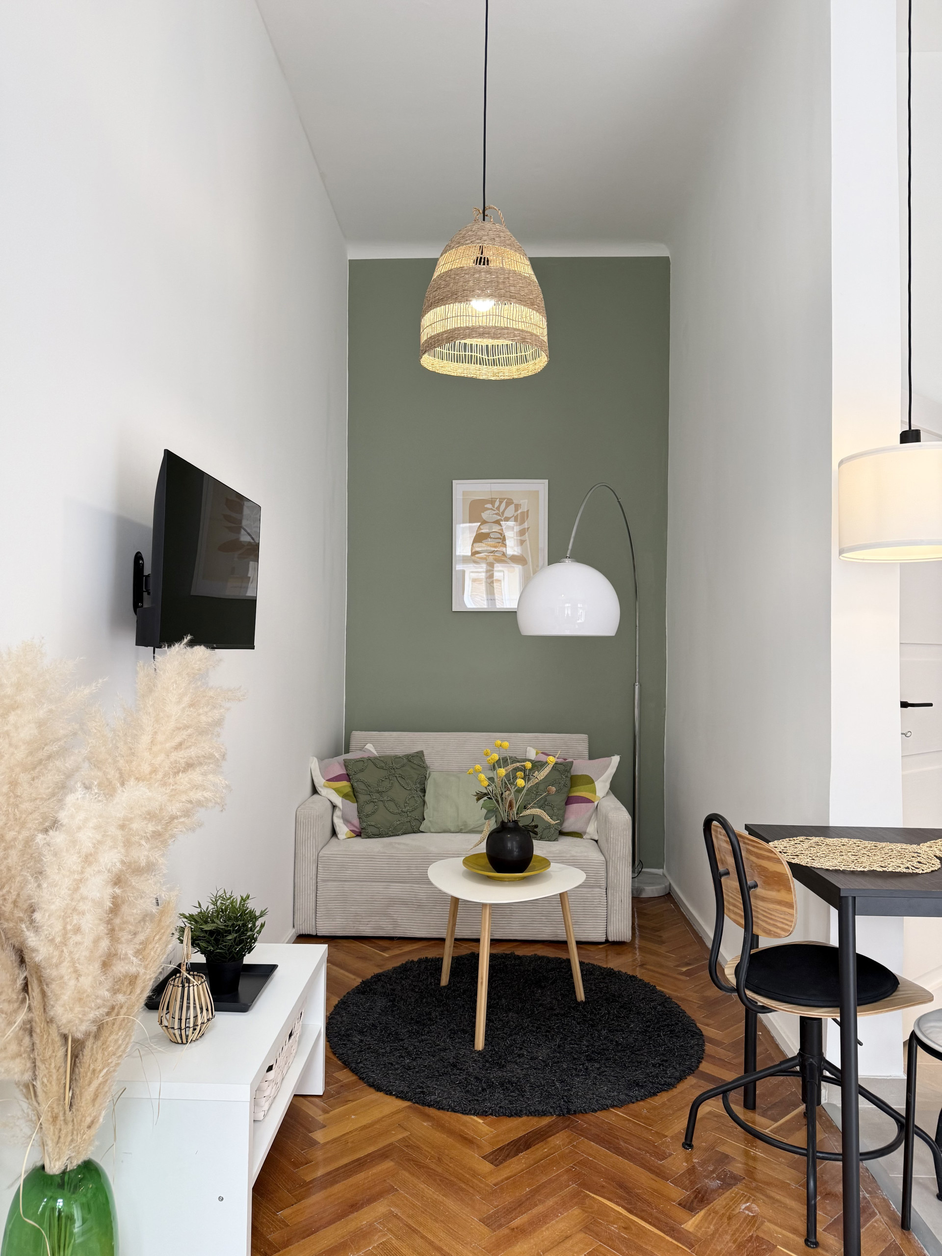 Living room with sofa and dining area