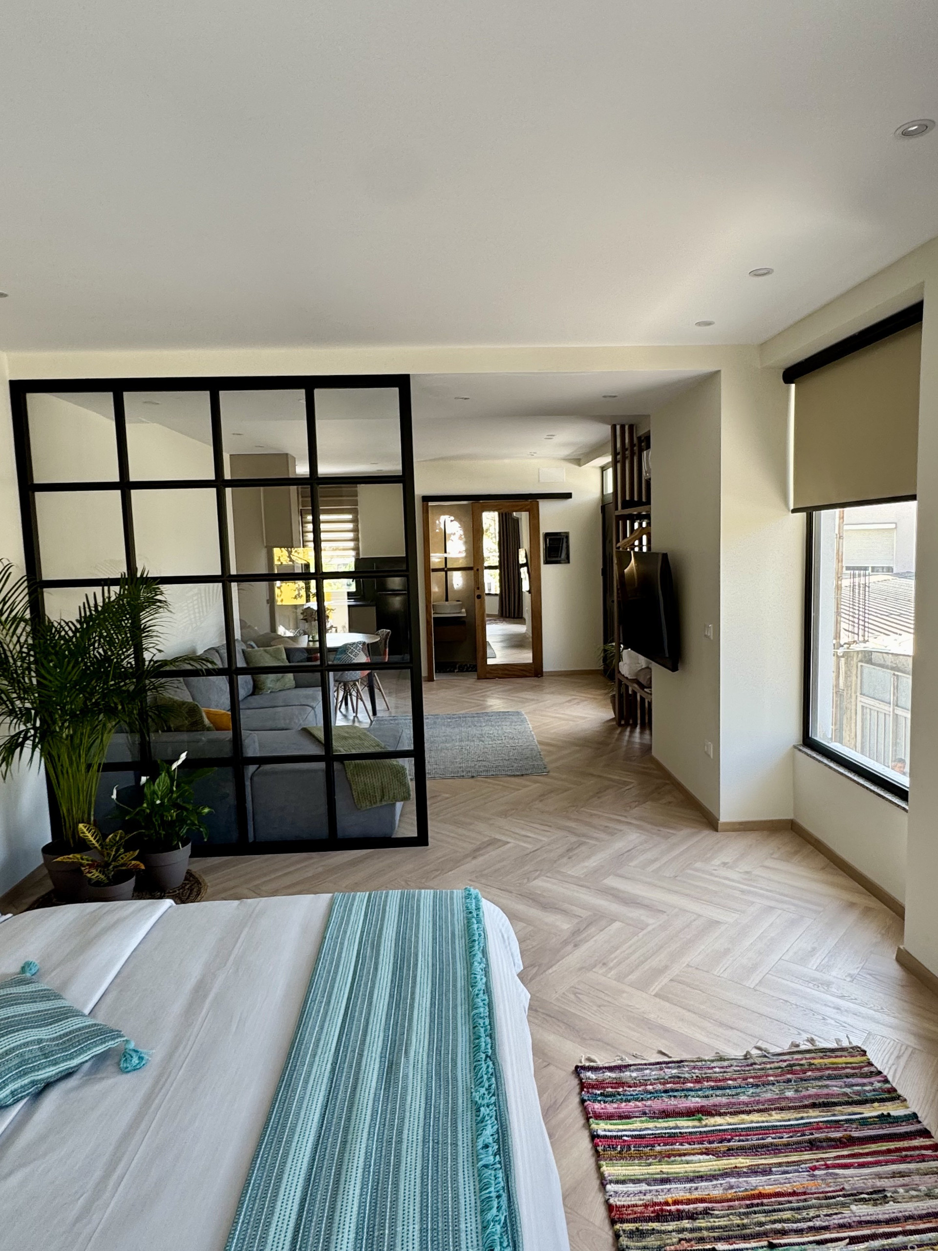Open-plan studio with herringbone floor