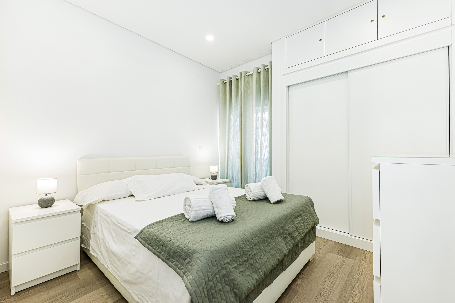 Bedroom with double bed, wardrobe