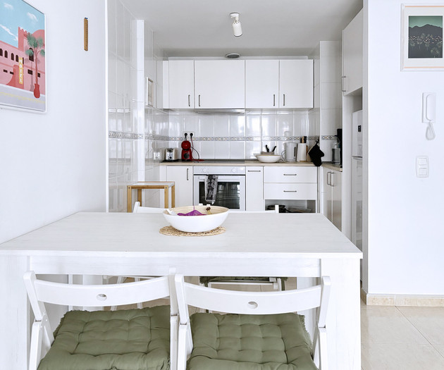Dining table with kitchen view