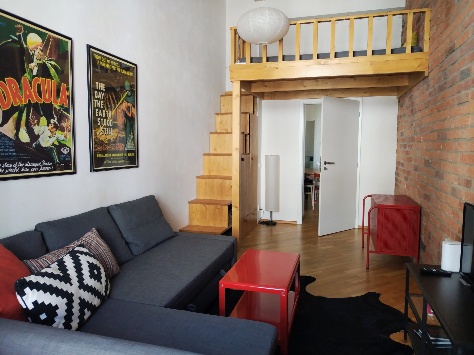 Living room with sleeping loft (Bedroom 2)