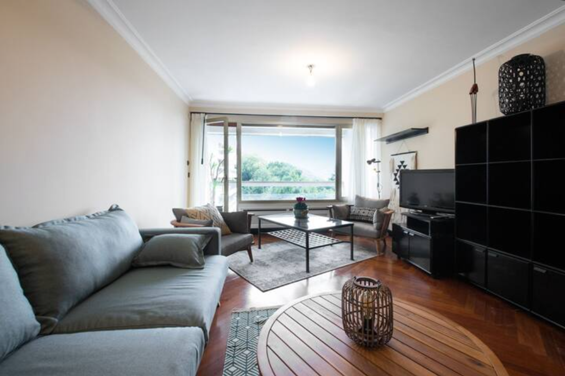 Bright living room with large window