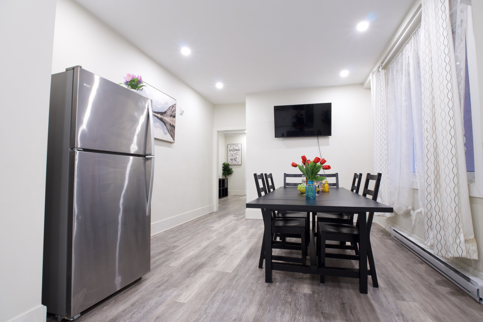 Dining area with fridge and TV