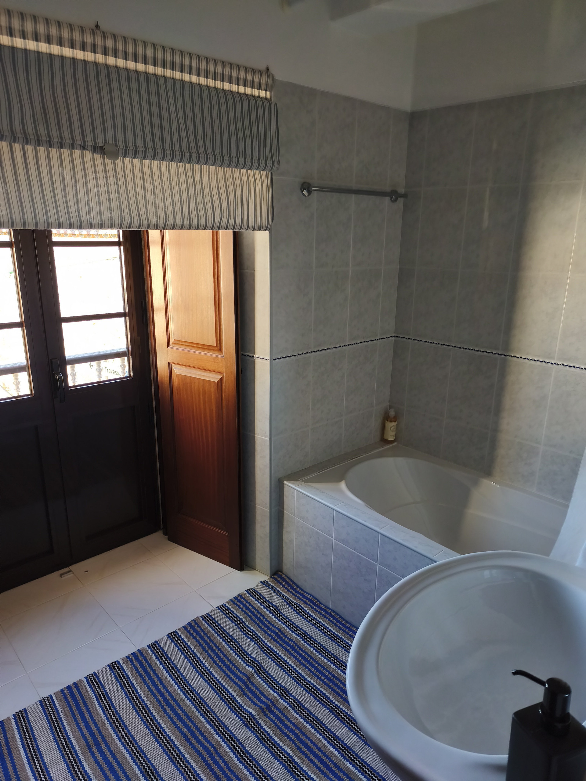Bathroom with tub and sink