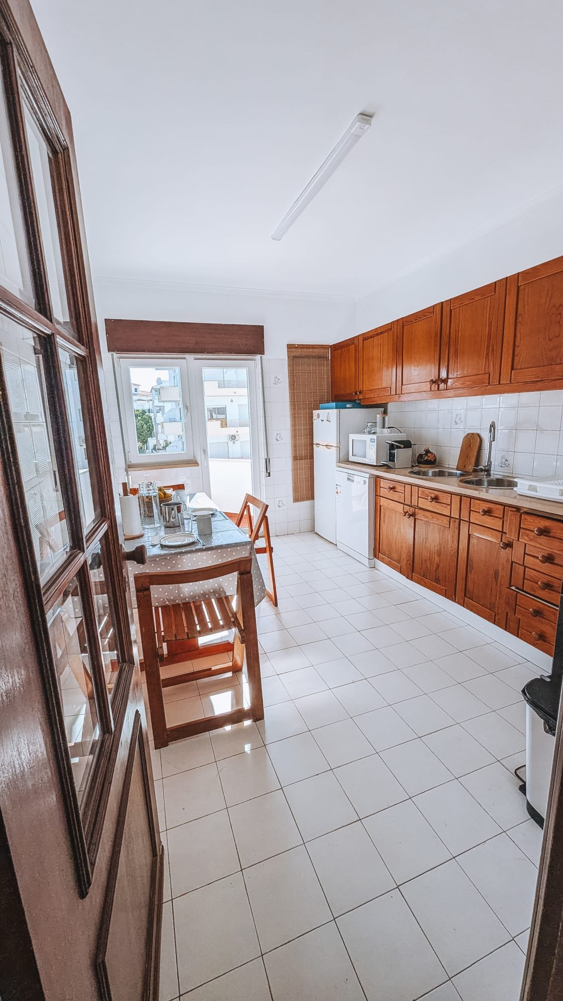 Bright kitchen with wooden cabinets