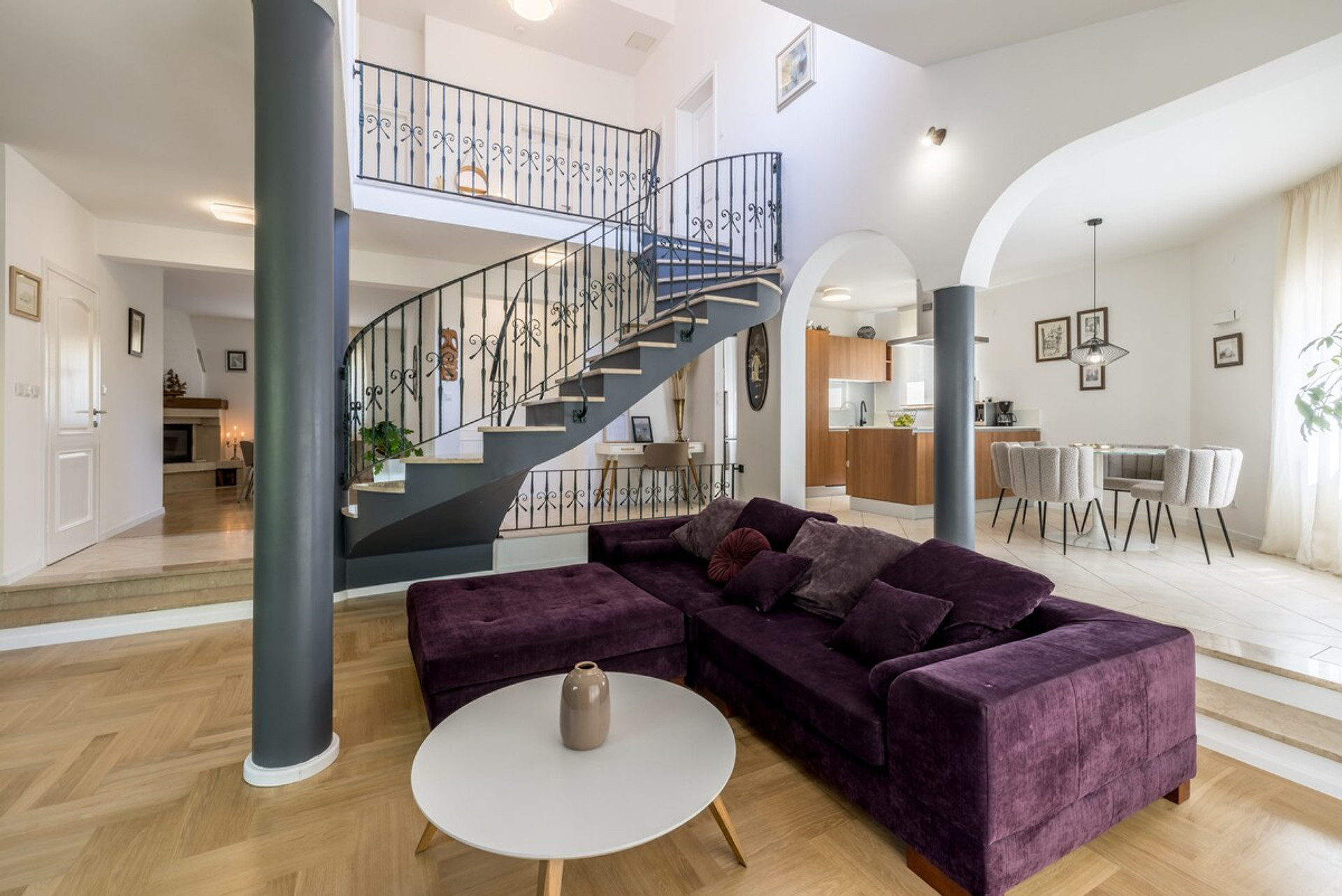 Spacious living room connected to the open-concept kitchen, creating a welcoming space for gathering and socializing