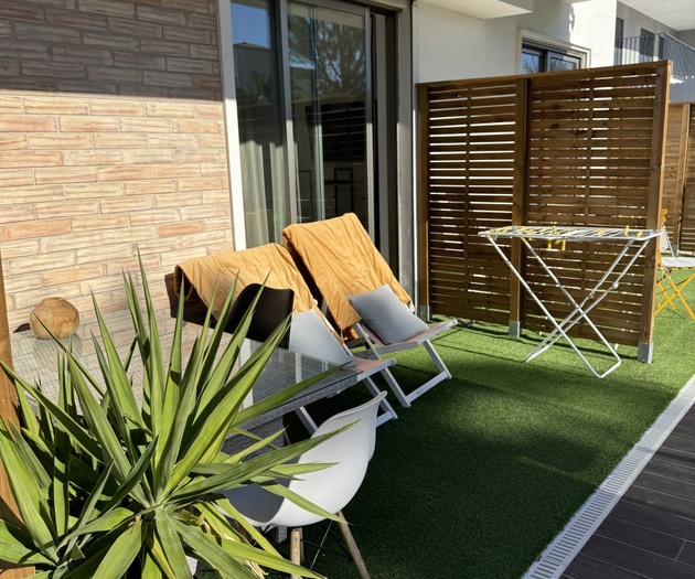 Balcony with lounge chairs