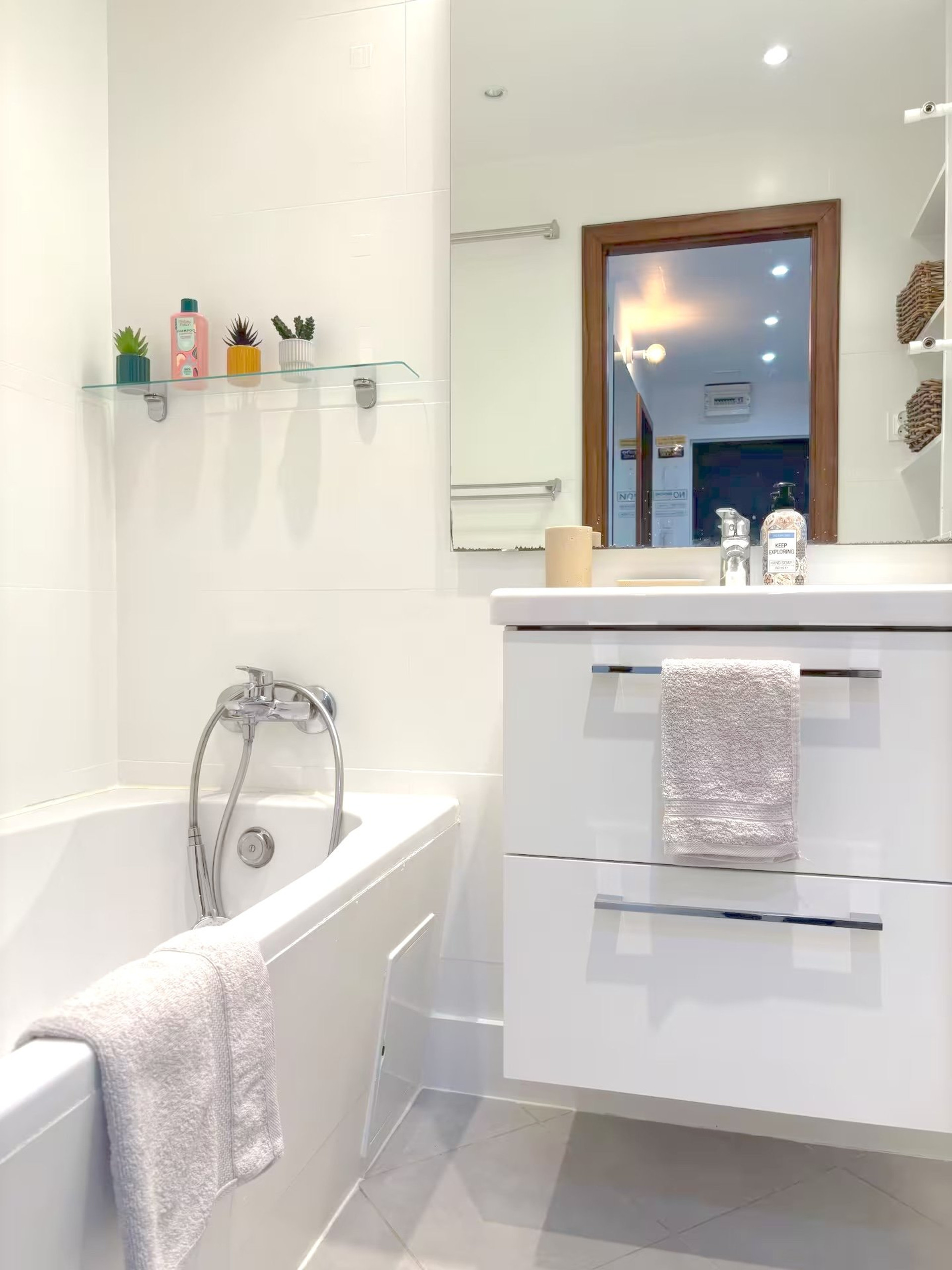 Bathroom with tub and sink