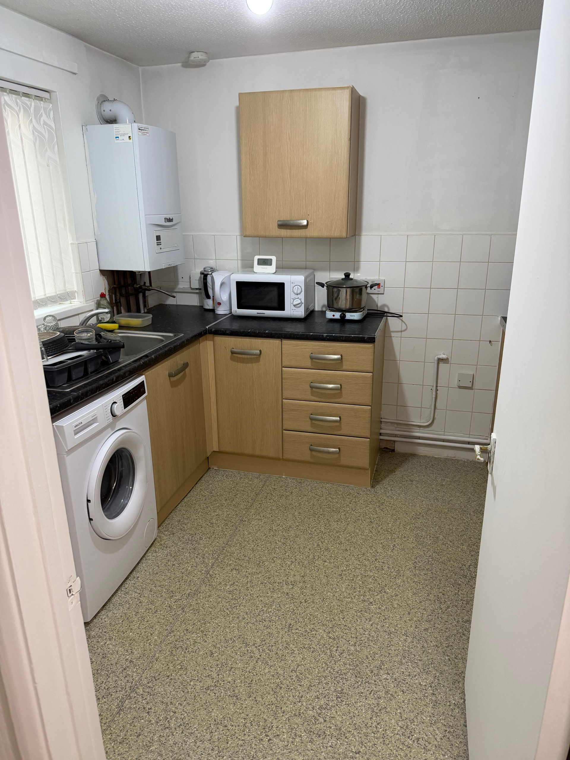 Kitchen with appliances and cabinets