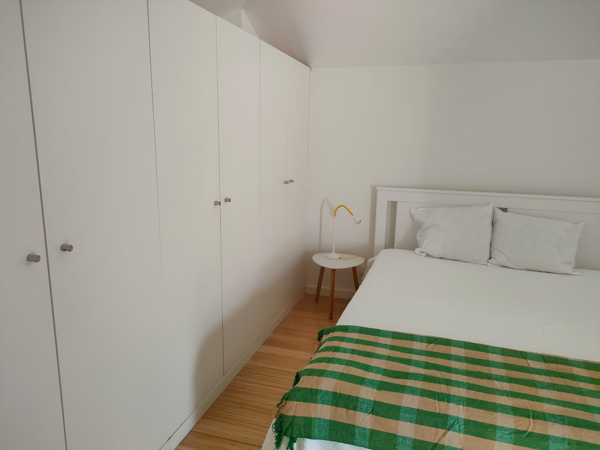Bedroom with wardrobe and double bed