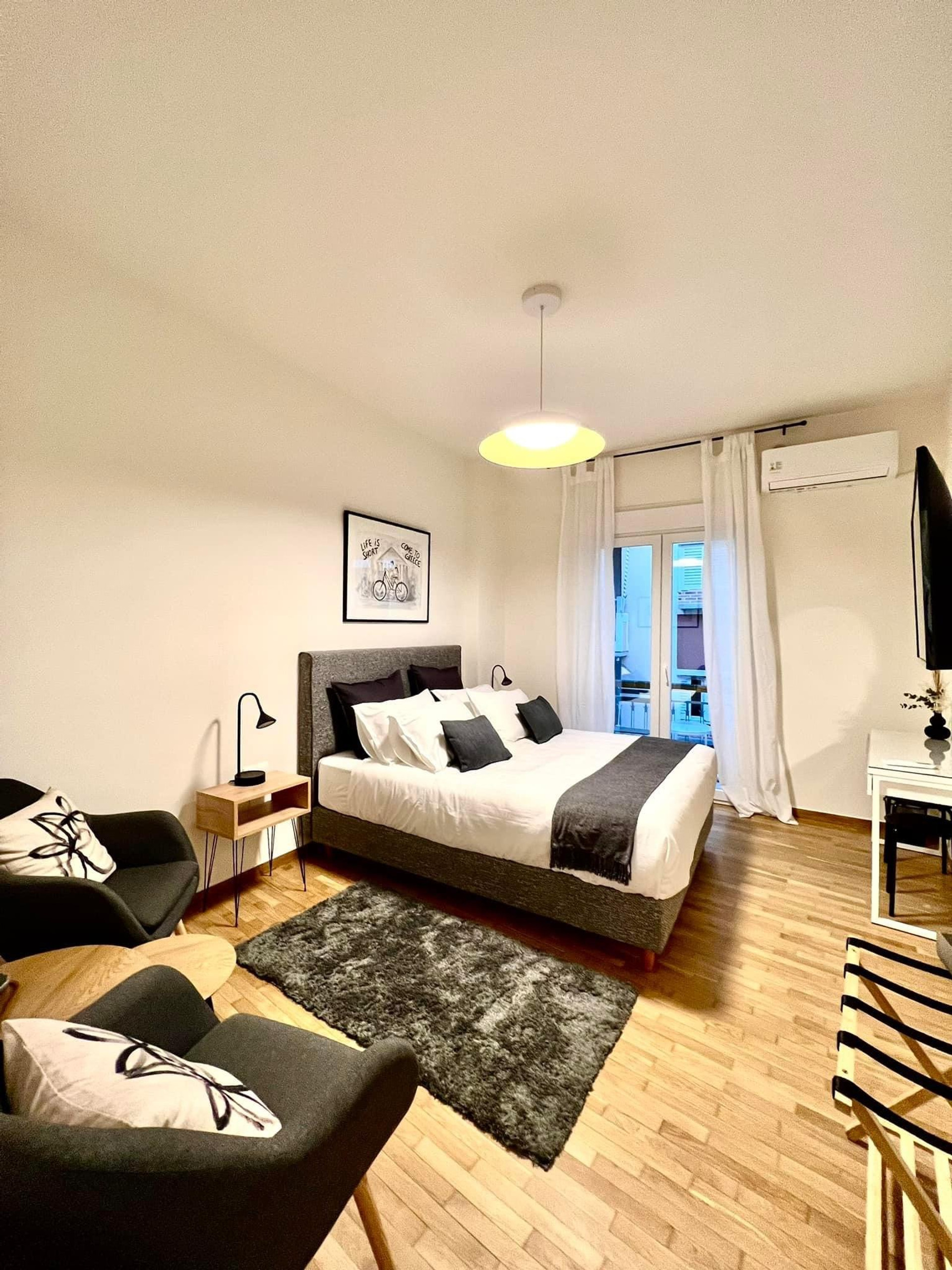 Bedroom overview with balcony access