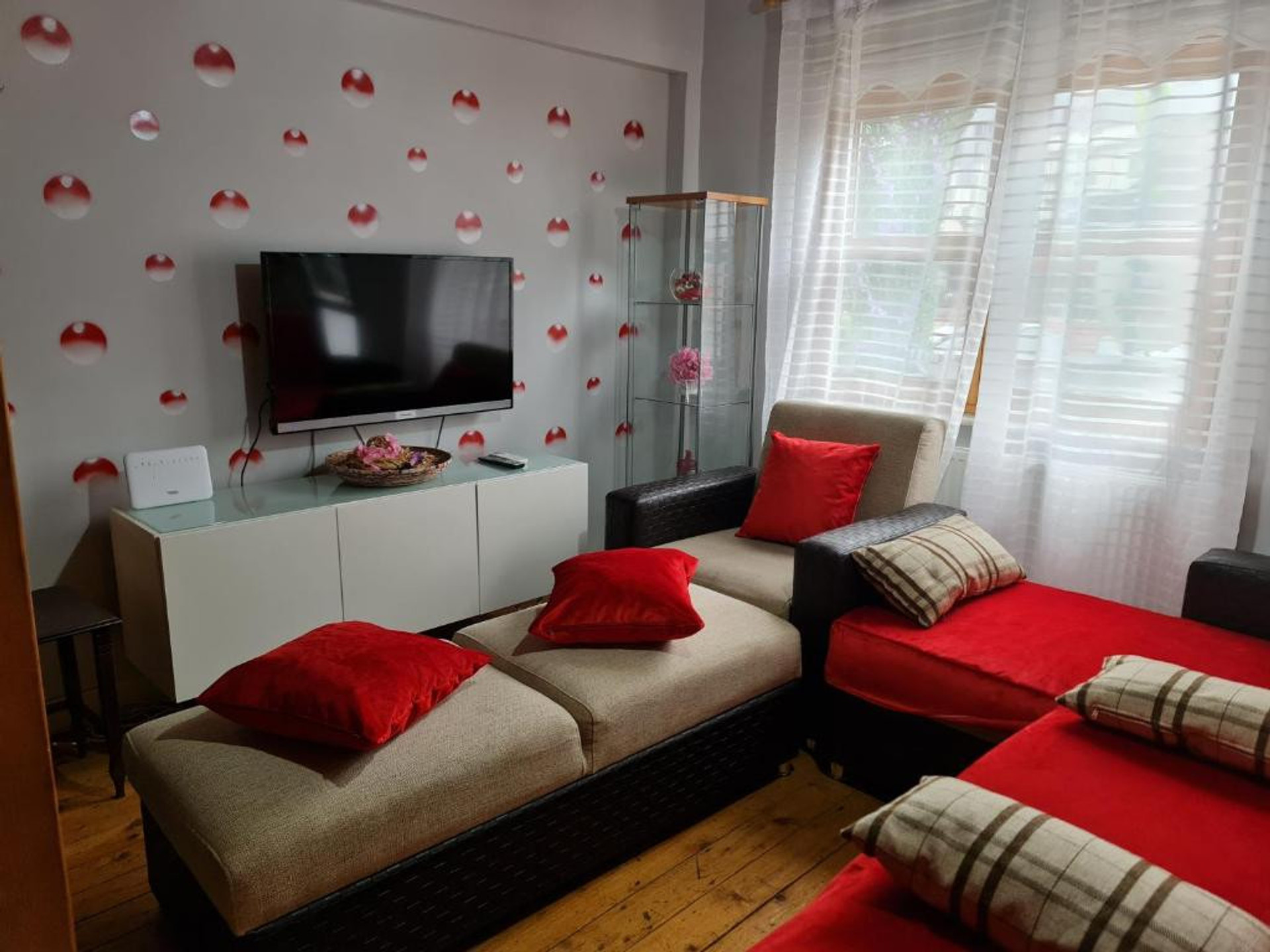 Living room with TV and sofas