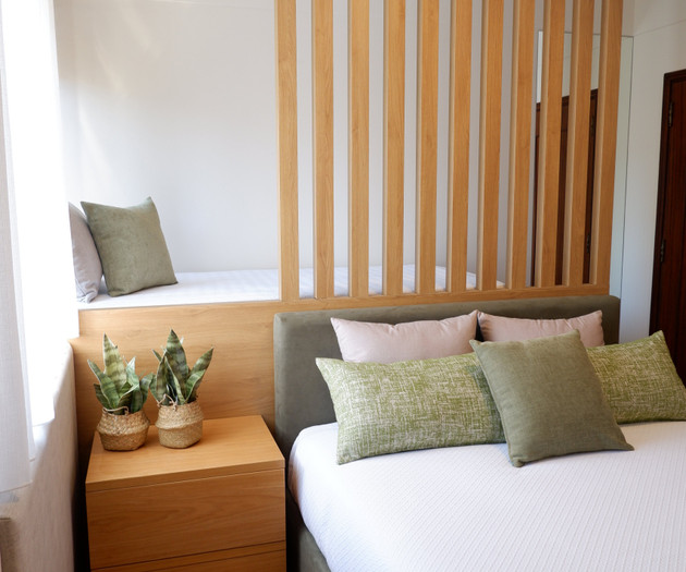 Bedroom with slatted divider