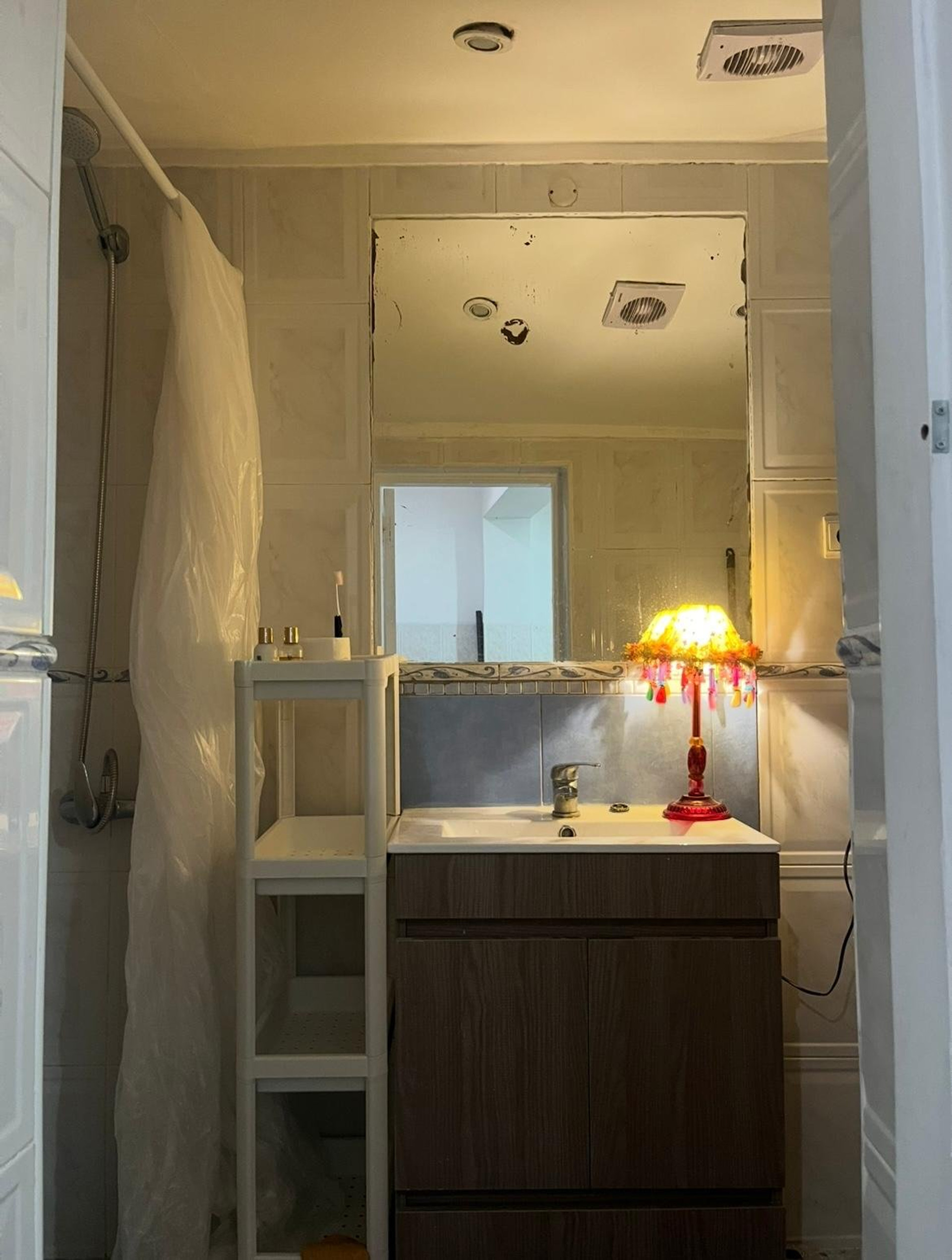 Bathroom with shower and vanity