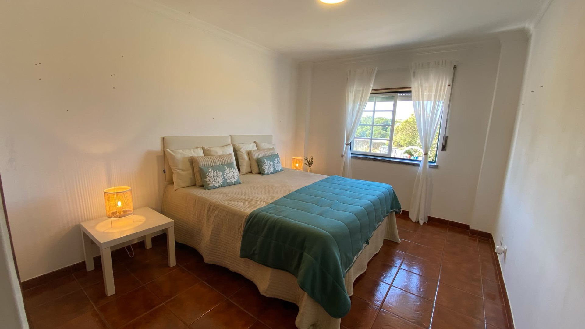 Bright bedroom with double bed